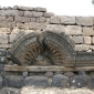 Synagogue at Chorazin, decorated stone lintel with conch<br>Photo by SeeTheHolyLand.net